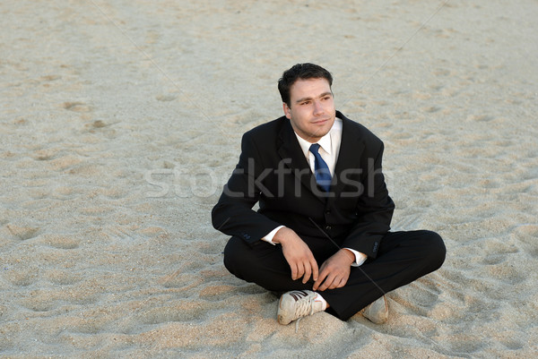 Stockfoto: Gek · jonge · dom · zakenman · strand · zonsondergang