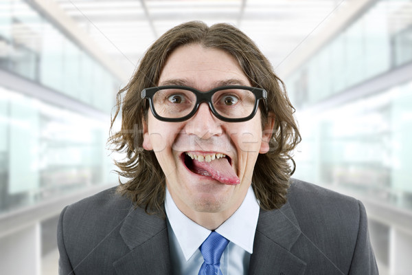 Hülye férfi fiatal üzletember portré iroda Stock fotó © zittto
