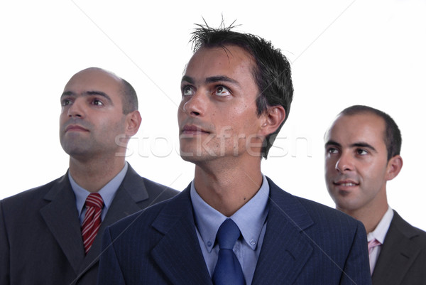 Tre uomo d'affari isolato bianco focus centro Foto d'archivio © zittto