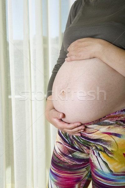 Kobieta w ciąży domu ciało matka ciąży Zdjęcia stock © zittto