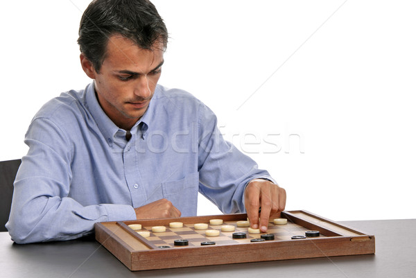 Spielen junger Mann Spiel isoliert weiß Schach Stock foto © zittto
