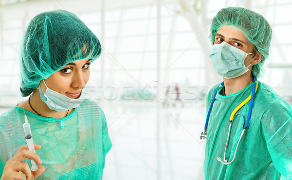 Ärzte zwei jungen isoliert weiß Mann Stock foto © zittto