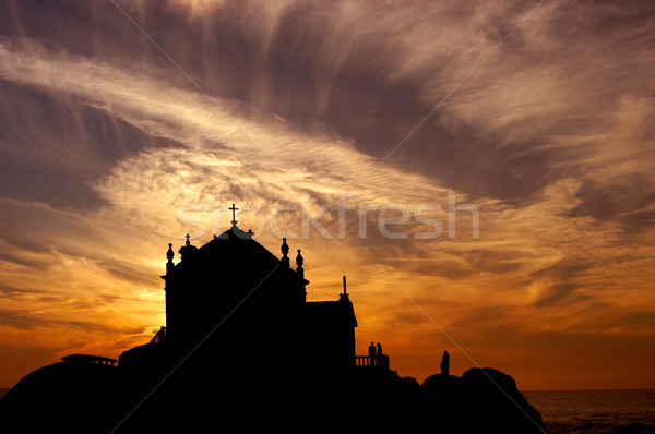 Pôr do sol igreja norte Portugal água sol Foto stock © zittto