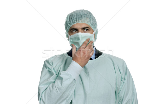 Nachdenklich jungen männlichen Arzt isoliert weiß Mann Stock foto © zittto