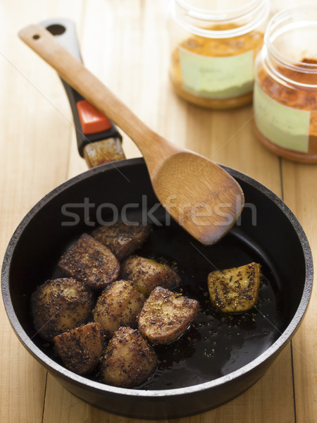 Indiai krumpli közelkép serpenyő zöldségek vasaló Stock fotó © zkruger