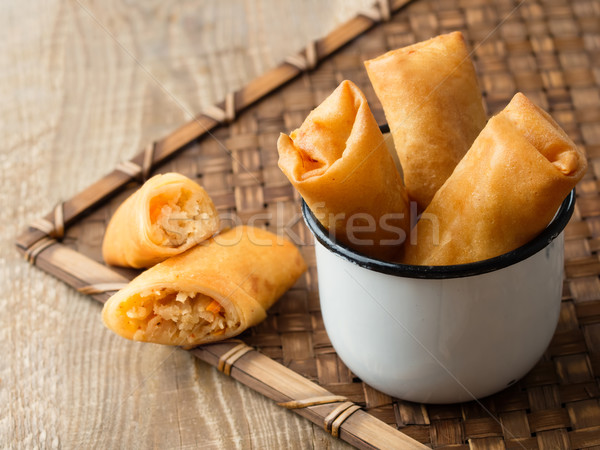 rustic golden chinese spring rolls Stock photo © zkruger