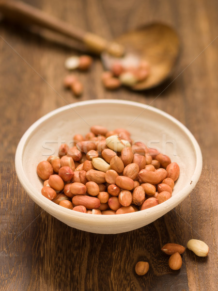 rustic raw uncooked peanuts Stock photo © zkruger
