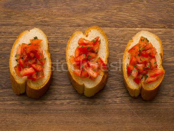 Bruschetta kenyér közelkép olasz piros paradicsom Stock fotó © zkruger