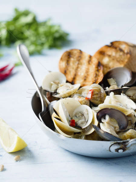 rustic italian vongole clams in white wine sauce Stock photo © zkruger