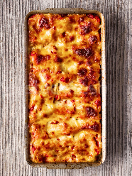rustic italian baked spinach ricotta cannelloni pasta Stock photo © zkruger