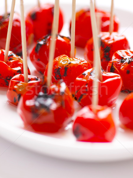Pörkölt koktélparadicsom közelkép étel piros szín Stock fotó © zkruger