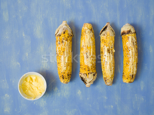 rustic grilled golden corn cob Stock photo © zkruger