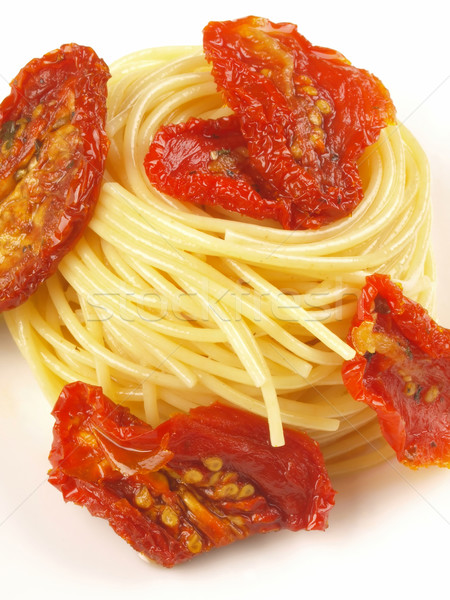 spaghetti with sun dried tomatoes Stock photo © zkruger