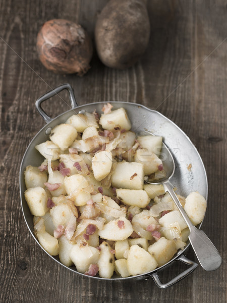 rustic german pan fried potato bratkartoffeln Stock photo © zkruger