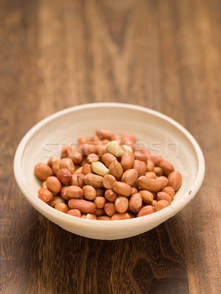 rustic raw uncooked peanuts Stock photo © zkruger