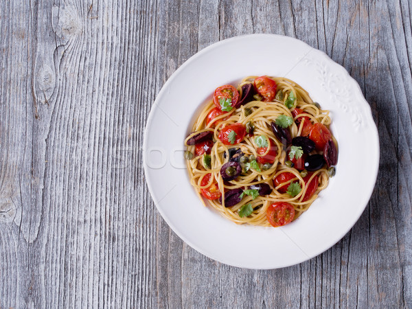 rustic italian spaghetti puttanesca pasta Stock photo © zkruger