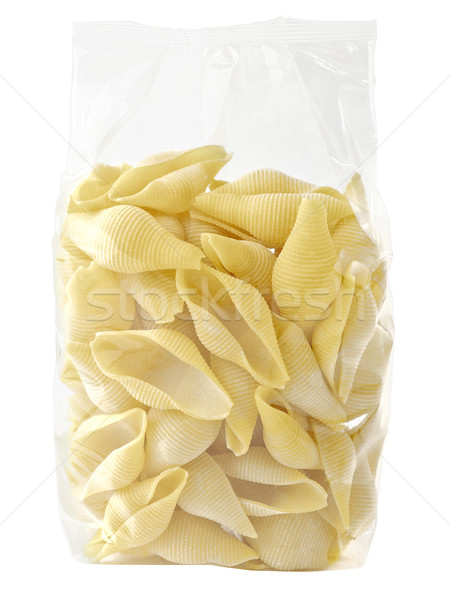 raw uncooked italian conchiglie jumbo shell pasta in plastic bag Stock photo © zkruger