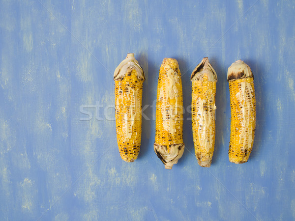 rustic grilled golden corn cob Stock photo © zkruger