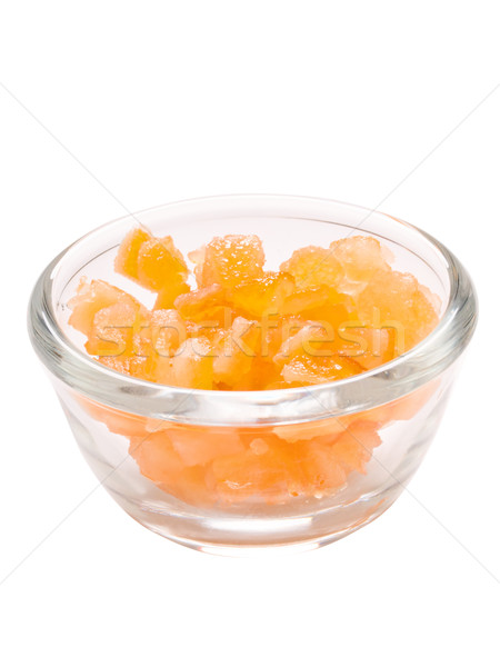 close up of a bowl of candied orange citrus peel isolated Stock photo © zkruger