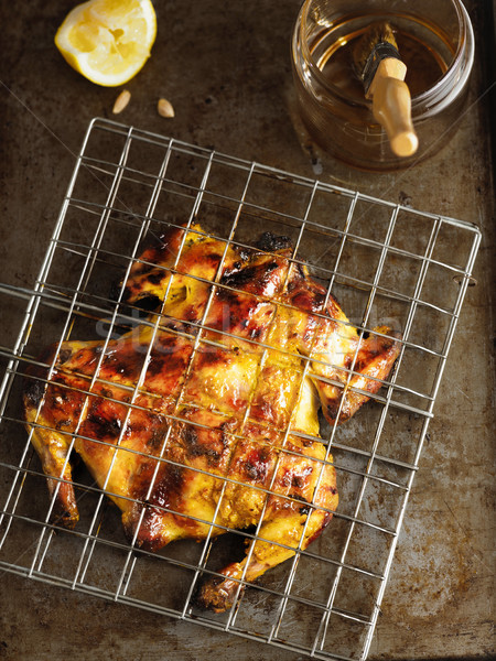 rustic barbecued whole chicken Stock photo © zkruger