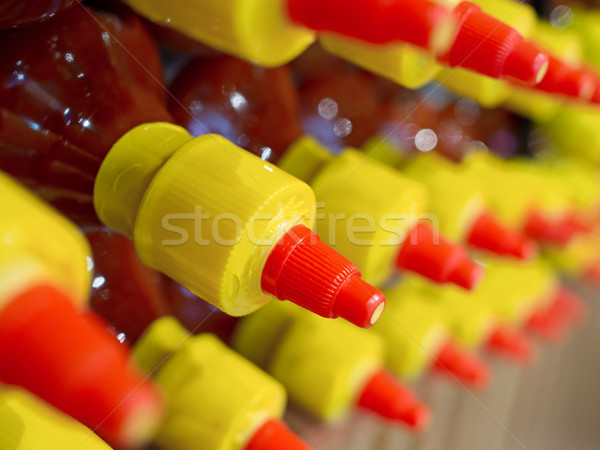 rows of bottled sauce Stock photo © zkruger