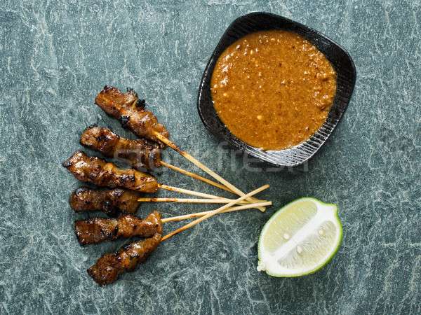 rustic indonesian satay meat skewer Stock photo © zkruger