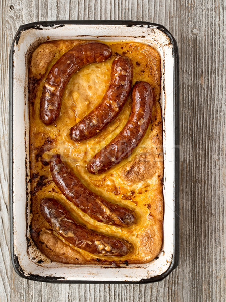 rustic english pub grub toad in the hole Stock photo © zkruger