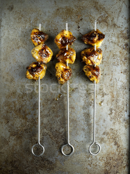 Rustykalny złoty kurczaka ogon BBQ Zdjęcia stock © zkruger