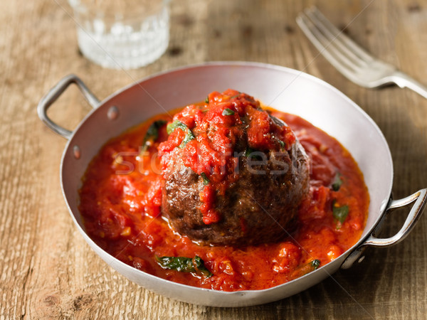 rustic italian meatball in tomato sauce Stock photo © zkruger
