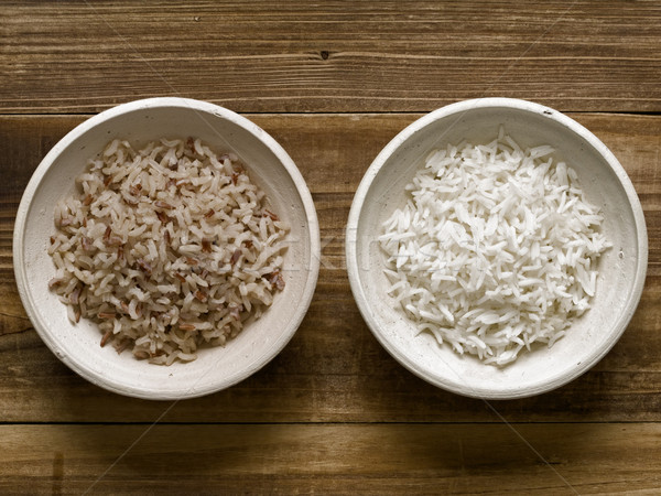 rustic cooked polished and unpolished rice Stock photo © zkruger