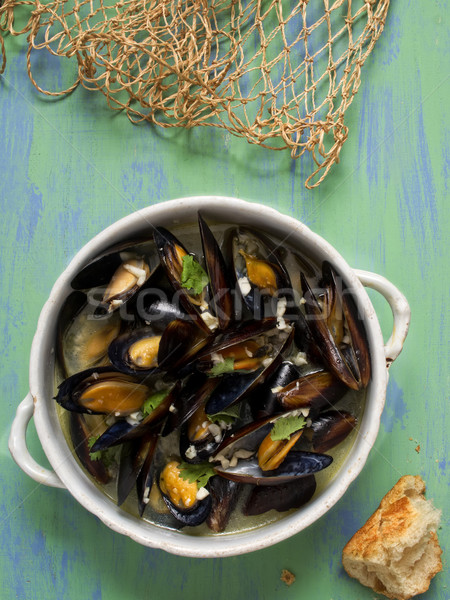 rustic black mussel in garlic white wine sauce Stock photo © zkruger