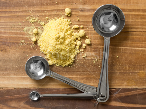 mustard powder with measuring spoons Stock photo © zkruger