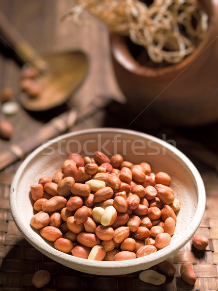 rustic raw uncooked peanuts Stock photo © zkruger