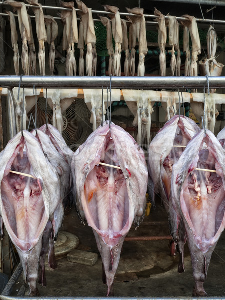 fish hung up to dry for preservation Stock photo © zkruger