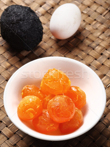 Rusztikus kínai arany sózott tojás tojássárgája Stock fotó © zkruger