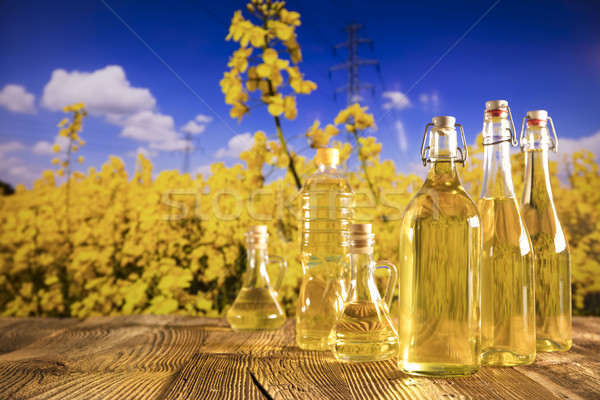 Olaj zöldség üvegek üveg asztal tavasz Stock fotó © zolnierek