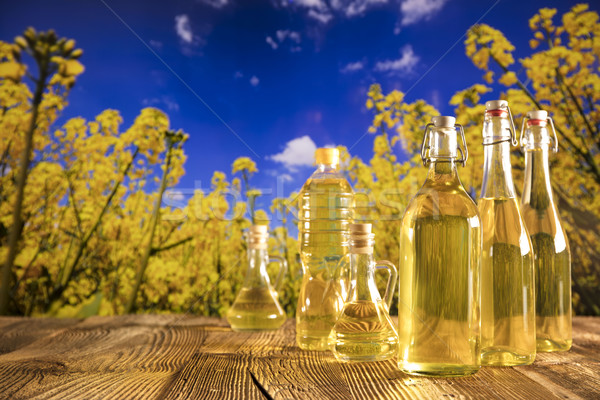 Olie plantaardige flessen glas tabel voorjaar Stockfoto © zolnierek