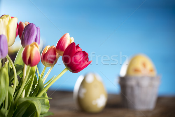 Húsvét virágcsokor tulipánok húsvéti tojások színes bokeh Stock fotó © zolnierek