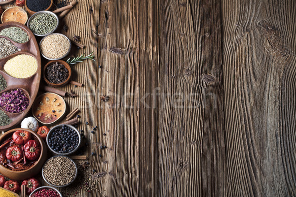 Specerijen ingesteld kleurrijk verschillend kommen houten tafel Stockfoto © zolnierek