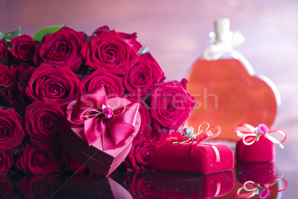 Special day concept, bouquet of roses on glass table Stock photo © zolnierek
