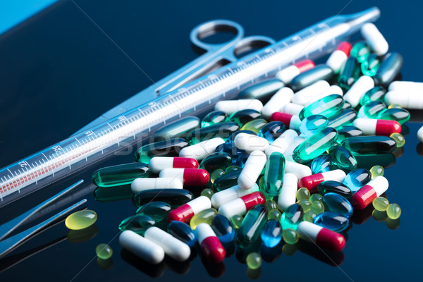 Pharmacy theme – pills. Stock photo © zolnierek