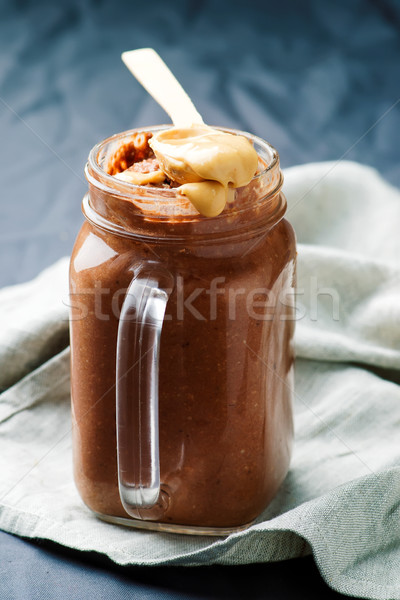 Manteca de cacahuete chocolate jar frutas fondo leche Foto stock © zoryanchik