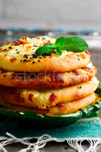 arab flat bread, with cheese, meat and vegetables.  Stock photo © zoryanchik