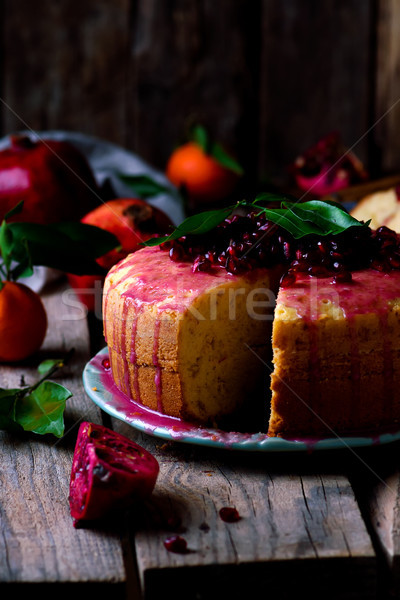 tangerine bundt cake with pomegranate glaze..selective focus Stock photo © zoryanchik