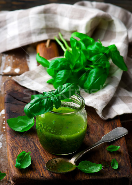 BASIL VINAIGRETTE in glass jar. rustic style.  Stock photo © zoryanchik