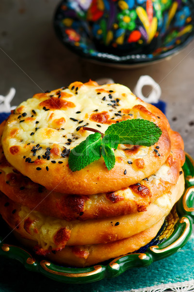 arab flat bread, with cheese, meat and vegetables.  Stock photo © zoryanchik