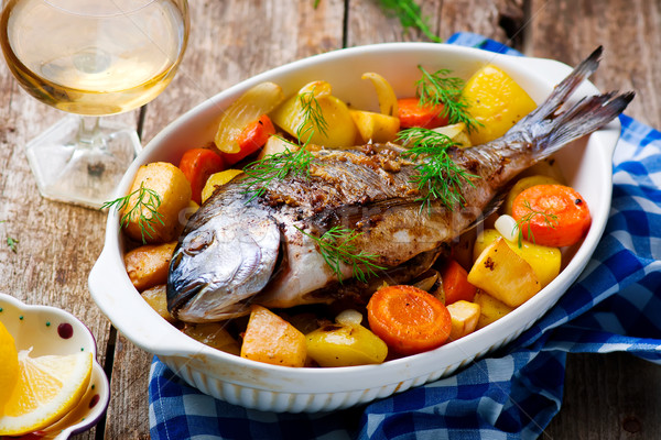 Oven Baked Fish and Vegetables Stock photo © zoryanchik