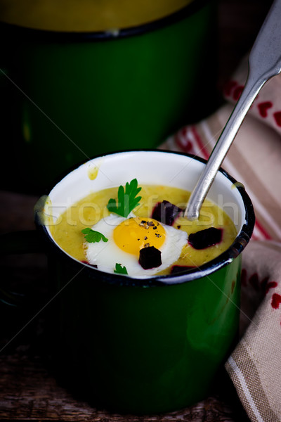 potato soup - mashed potatoes with fried eggs  Stock photo © zoryanchik