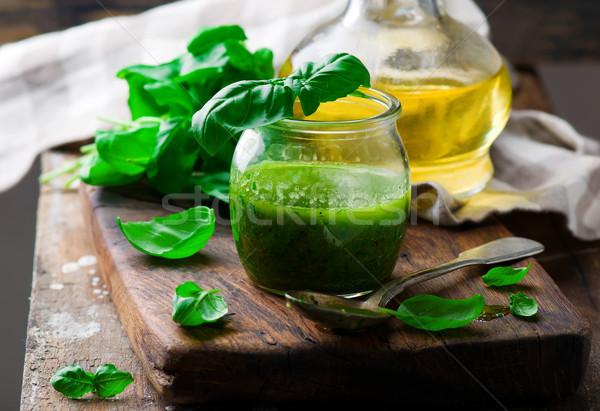 BASIL VINAIGRETTE in glass jar. rustic style.  Stock photo © zoryanchik