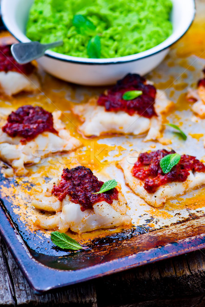 Stock photo: the baked cod with green pea